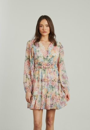 Floral print dress with long sleeves, ruffled hem, and elastic waist. Soft, lightweight fabric in pastel colors featuring pink and green flowers.