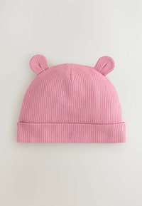 Rosa gerippte Strickmütze mit umgeschlagenem Rand und zwei ohrähnlichen Akzenten oben. Weiche Textur, entworfen für Komfort und Wärme.