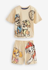 Beżowy t-shirt z krótkim rękawem z grafiką kreskówkowych psów oraz dopasowane beżowe szorty z motywem psów, wykonane z miękkiego, lekkiego materiału.