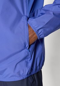 ASICS ICON JACKET - Veste coupe-vent - royal