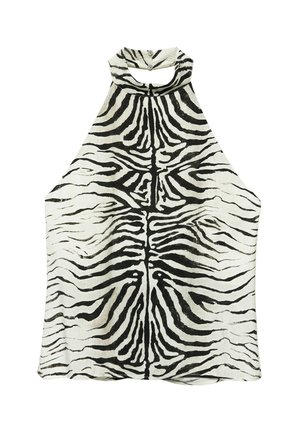 Haut sans manches à col halter avec motif zèbre noir et blanc et fermeture par bouton à l’arrière du cou.
