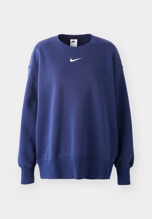 Donkerblauwe sweatshirt met lange mouwen, ronde hals, ribgebreide mouwen en onderkant. Bevat een klein wit Nike-logo op de borst. Zachte textuur.