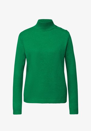 Vihreä neulottu villapaita, jossa on korkea kaulus, pitkät hihat ja napit vasemmalla olkapäällä. Kankaan pinta on teksturoitu, ja hihansuut sekä helma ovat joustinneulosta.