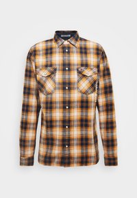 Camicia a maniche lunghe con bottoni, stampa a quadri arancione, blu navy, grigia e bianca, due tasche frontali con bottone sul petto e logo "Tommy Jeans" sulla tasca.
