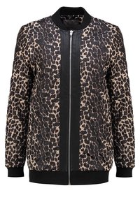 Veste aviateur matelassée avec un motif léopard en beige et noir, dotée d'un zip sur le devant et d'un col et de poignets côtelés noirs.