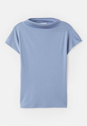 Light blue short-sleeve top made from soft fabric. Features a scoop neck design and a loose fit, with clean hems and no patterns.