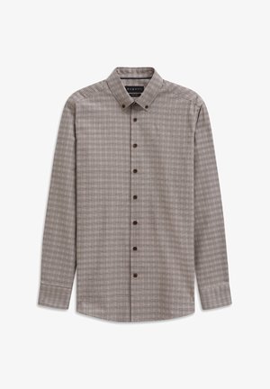 Beige long-sleeve button-up shirt with dark brown checkered pattern and brown buttons, featuring a button-down collar.