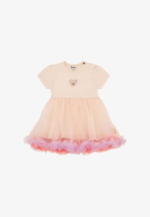 Vestido de algodón rosa con mangas cortas, con un emblema de oso. Falda de tul con un dobladillo con volantes en capas en tonos rosa y lavanda.