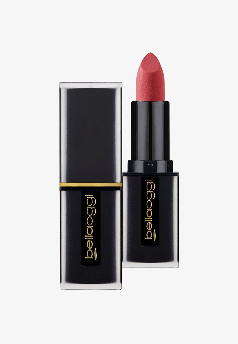 Rossetto con una delicata tonalità rosa in un contenitore nero, dotato di una fascia accentuata dorata e una punta angolata e liscia per un'applicazione precisa.