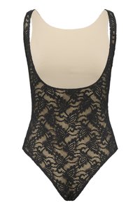 Black lace bodysuit with floral patterns and nude lining, featuring scoop neckline and sleeveless design.