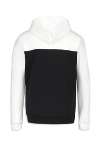 Felpa con cappuccio caratterizzata da un design a metà, con tessuto nero nella parte inferiore e bianco in quella superiore, realizzata in materiale morbido e testurizzato.
