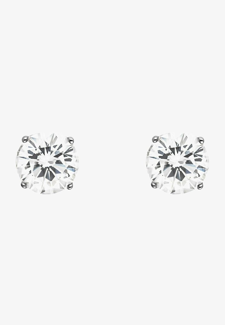 Round diamond stud earrings in a four-prong setting, featuring clear, faceted stones with a polished metal backing.