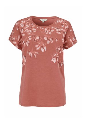 Ruosteenvärinen lyhythihainen paita, jossa pyöreä pääntie ja vaaleanpunainen kukkakuvio yläosassa etupuolella ja hihoissa.