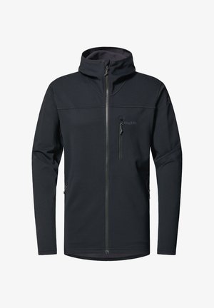 Giacca softshell nera con colletto alto, zip frontale completa, due tasche laterali e una tasca sul petto; presenta una texture liscia e un design minimalista.