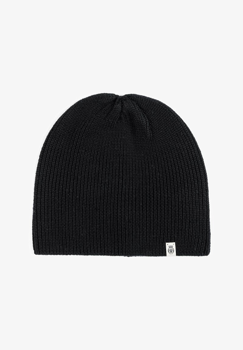 Black knitted beanie with ribbed texture, rounded crown, and a small white fabric tag on the side. Stretchable material for comfort.