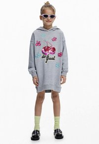 Gray oversized hoodie dress features a cherry design with sequins, floral accents, and the logo "desigual." Paired with green socks and black shoes.