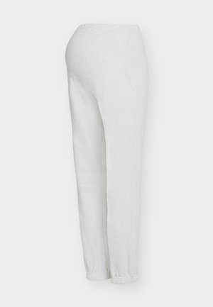 Pantaloni premaman grigio chiaro realizzati in tessuto morbido. Caratterizzati da una vita elasticizzata, tasche laterali e polsini aderenti alle caviglie.