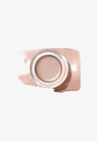 Nøgen cremeøjenskygge i en klar krukke, omgivet af et blødt, skimrende pink swatch. Glat tekstur med en metallisk glans.