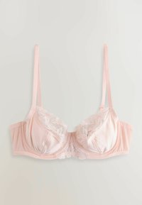 Sutien roz deschis din dantelă și satin, cu balene de susținere și bretele reglabile, prezentat întins pe un fundal neutru.