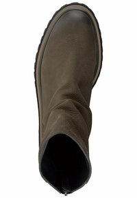 Botte chelsea en cuir marron avec un tige décontractée, bout rond et semelle en caoutchouc noir. Elle dispose d'une fermeture éclair et d'un extérieur texturé.