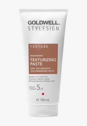 Goldwell Stylesign Roughman texturgebende Paste für mittleres bis grobes Haar, Halt Stufe 5, 100 ml weiße Squeeze-Tube mit braunem Etikett.