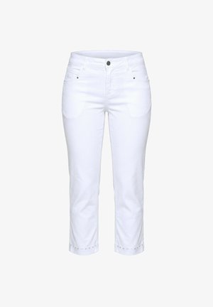 Białe spodnie o średnim stanie, skrócone, z zapięciem na guzik i zamek, przednimi kieszeniami oraz ozdobnymi oczkami wzdłuż dołu.