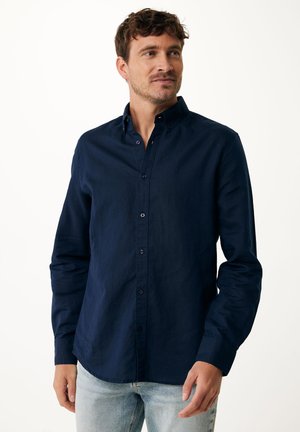 Navy blue button-up shirt made from fabric with a smooth texture. Features a collar, long sleeves, and front placket with buttons.