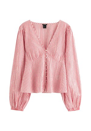 Bluse med lange ærmer med røde og hvide lodrette striber, dyb V-hals, knapper foran og rynkede manchetter.