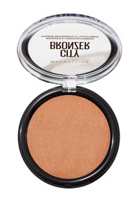 Kompakt bronzer med en slät, texturerad yta i varm bronston. Rund svart plastförpackning med ett genomskinligt lock som visar varumärket.