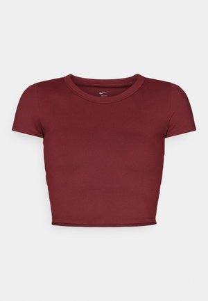 Burgundijas krāsas, īsām piedurknēm, īsais tops, izgatavots no gludas auduma ar apaļu dekoltē. Minimalistiskais dizains, bez redzamām logo vai rakstiem.