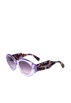 Occhiali da sole rotondi con frontale traslucido viola chiaro e aste spesse con motivo tartaruga, marchiati "Scotch & Soda" sul lato.