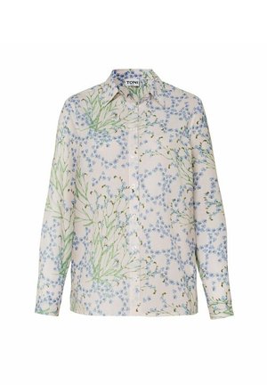 Langärmliges Hemd mit Knöpfen, hellem Hintergrund, mit zarten grünen Stielen und kleinem blauem Blumenmuster.