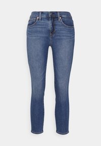 Mörkblå jeans i denim med en Figursydd design, fem fickor, guldfärgade detaljer och lätt blekning framtill. Avslutade vid vristerna.
