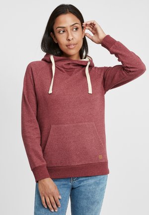 Haut à capuche bordeaux avec poche kangourou, doté de cordons de serrage crème et de poignets côtelés. Texture douce, design décontracté adapté à un usage quotidien.