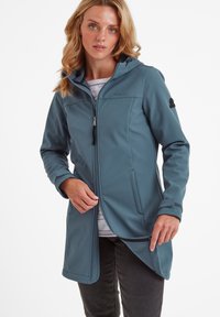 Softshell jacket in teal, featuring a zip closure, hood, side pockets, and contrasting interior lining. Designed for functionality and comfort.
