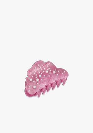 Artiglio per capelli in plastica rosa con un design ondulato, adornato con piccole perle bianche e borchie dorate. Presenta diversi denti interconnessi per una buona presa.