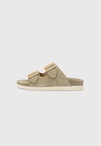 Khaki suede sandals with two adjustable straps and gold-tone buckles, featuring a flat sole and textured footbed for comfort.