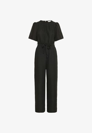 Black jumpsuit with short puff sleeves, a round neck, and a drawstring waist. Smooth textured fabric, wide legs, and a back zipper closure.