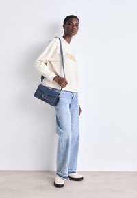 COACH POLISHED COVERED CLOSURE TABBY SHOULDER BAG - Handbag - denim