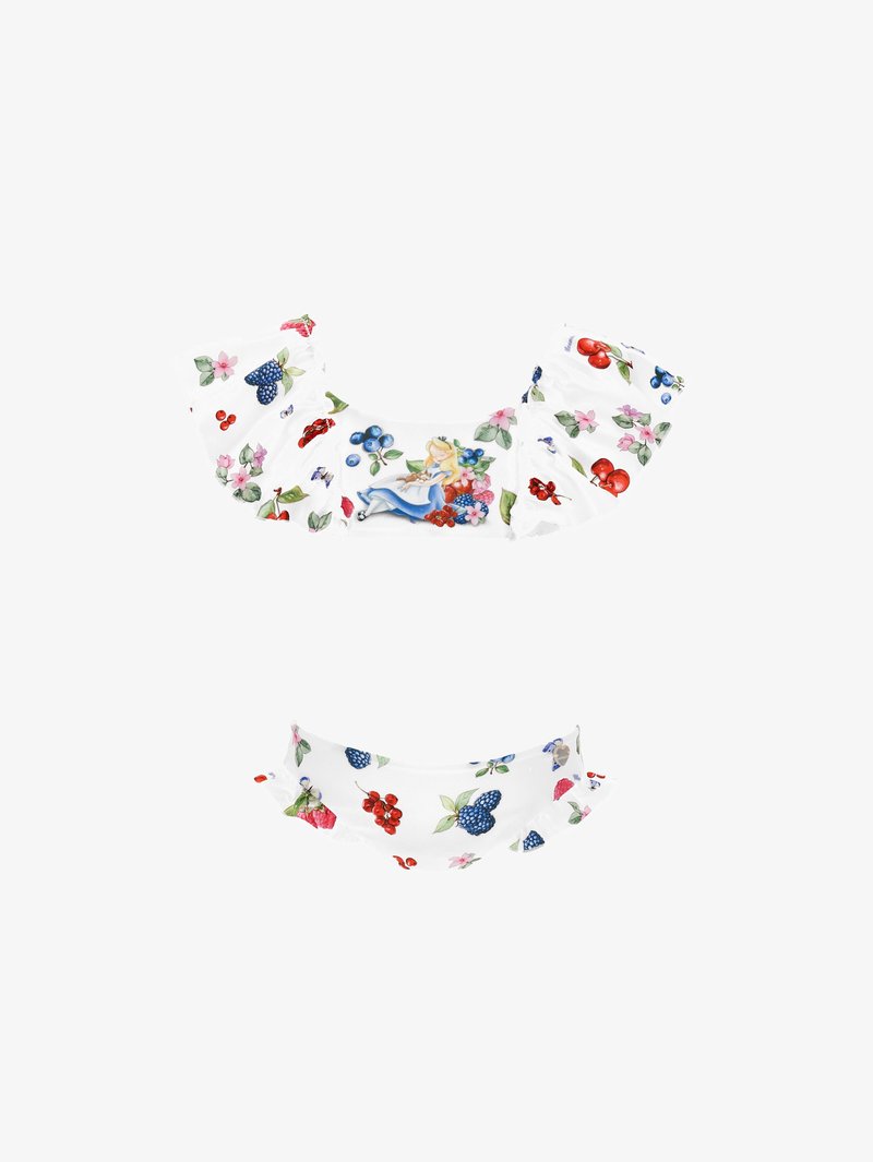 Top de biquíni branco com padrões florais e de frutas, apresentando mangas com babados e uma ilustração de uma rapariga. Tecido suave com uma textura lisa.