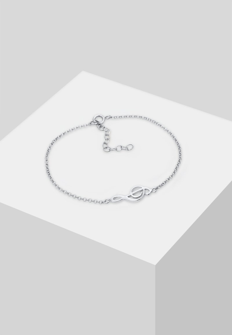 Pulsera de cadena de plata con cierre de bucle continuo, eslabones intrincados y longitud ajustable con un acabado delicado.
