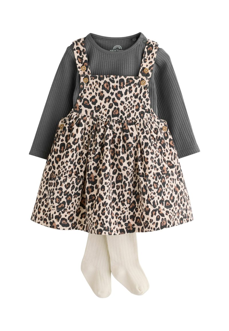 Leopard print dress with beige fabric, ribbed gray long-sleeve top, and cream ribbed socks. Features straps, buttons, and a flared skirt.