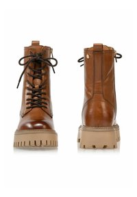 Brązowe skórzane botki za kostkę na sznurowanie z bocznym zamkiem błyskawicznym, teksturowaną podeszwą i beżową platformą z gumy. Oferują okrągłe sznurówki i pętelkę na tyle.