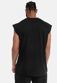 Karl Kani SMALL SIGNATURE SLEEVELESS TEE  - Topper - black