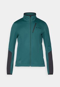 Tausfarbene FleecJacke mit hohem Kragen, durchgehendem Reißverschluss, schwarzen Akzentpaneelen an den Ärmeln und einer kleinen Brusttasche. Logo auf der Brust gedruckt.