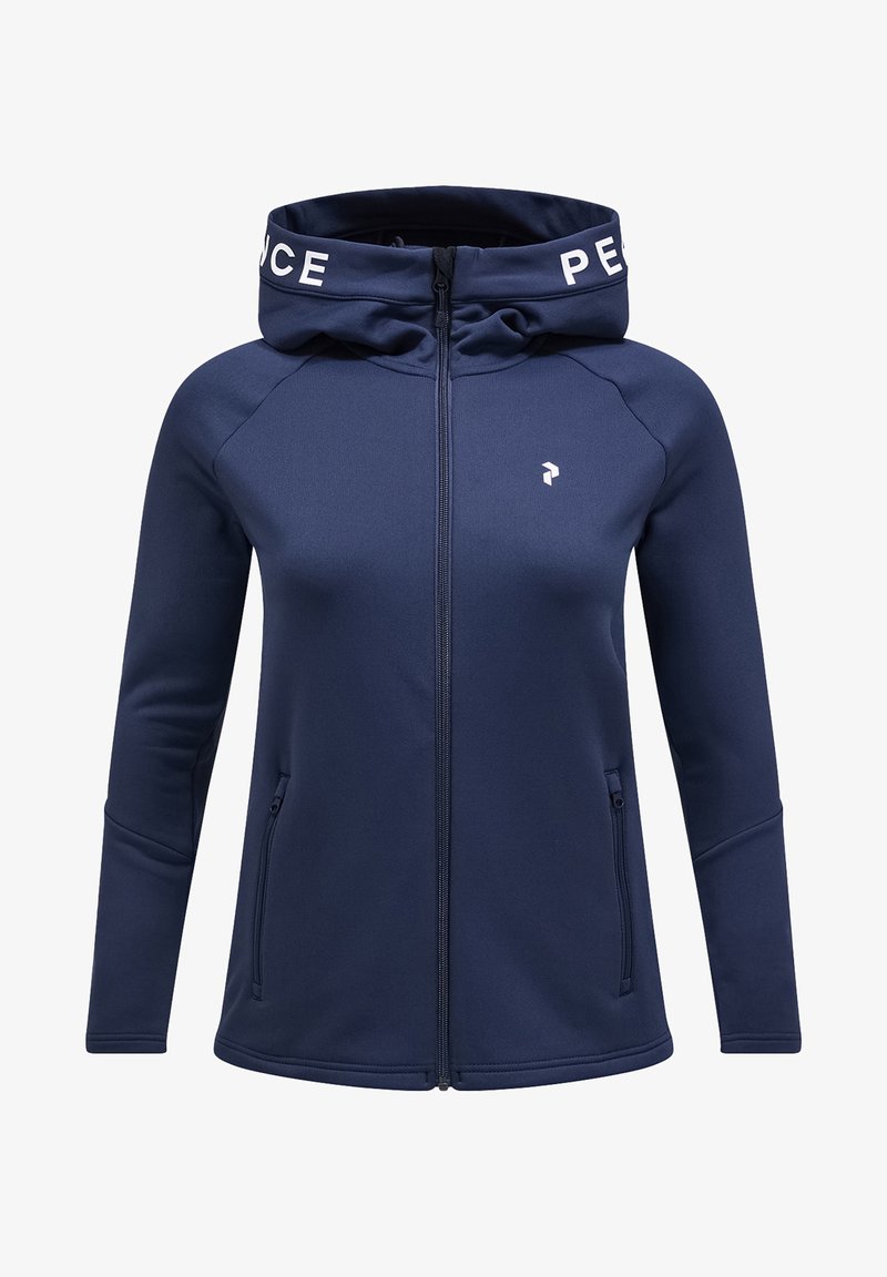 Felpa con zip blu navy e colletto alto, con logo bianco sul cappuccio, tasche con zip frontali e texture del tessuto liscia.