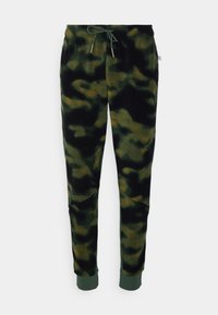 Vihreät, mustat ja keltaiset saalistus-housut. Sisältää narukiristyksen vyötäröllä, pehmeää kangasta ja ribbireunat nilkoissa.