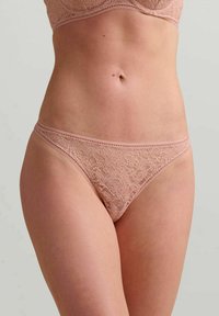 Wolford String - powder pink