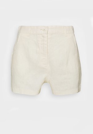 Shorts en lin couleur crème à taille haute avec fermeture par bouton et zip, passants pour ceinture, coupe ajustée.