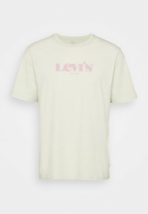 Light green cotton t-shirt with short sleeves, featuring a pink "Levi's" logo and text "Since 1873" across the chest. No patterns or additional details.